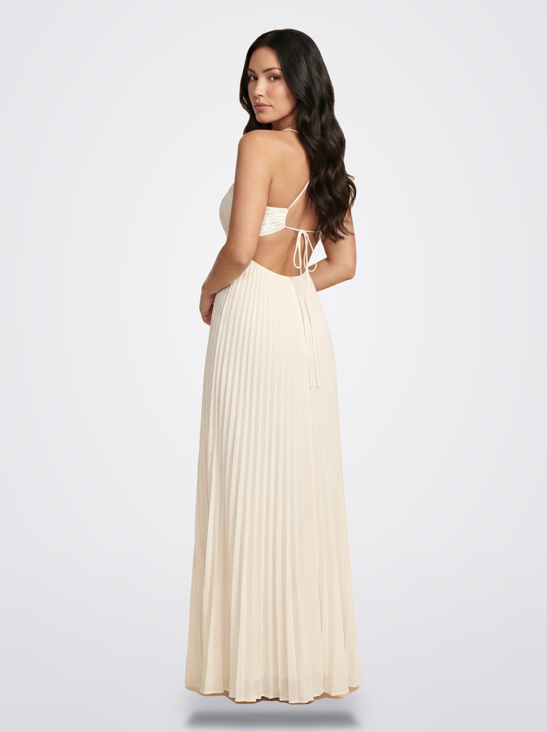 The Sienna Pleated Maxi Dress in White / Ivory - Side View | Amari Sydney